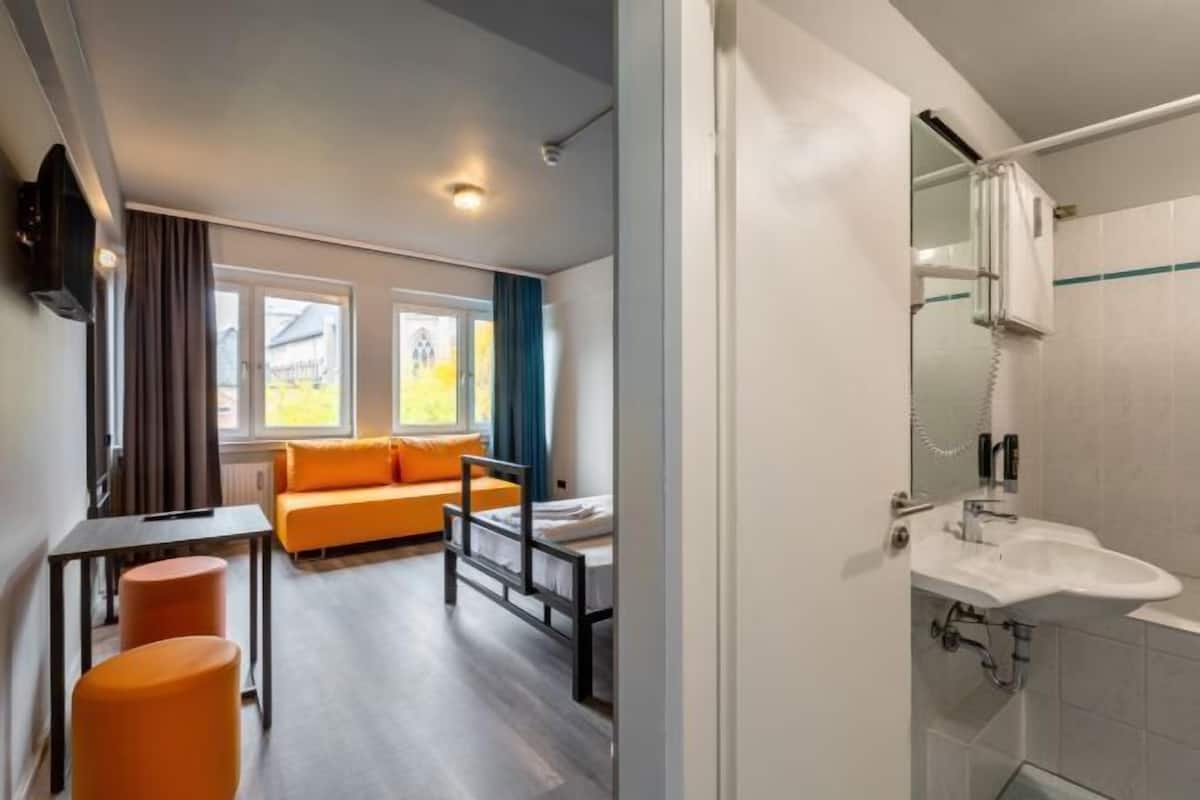 Desk, blackout drapes, iron/ironing board, free WiFi