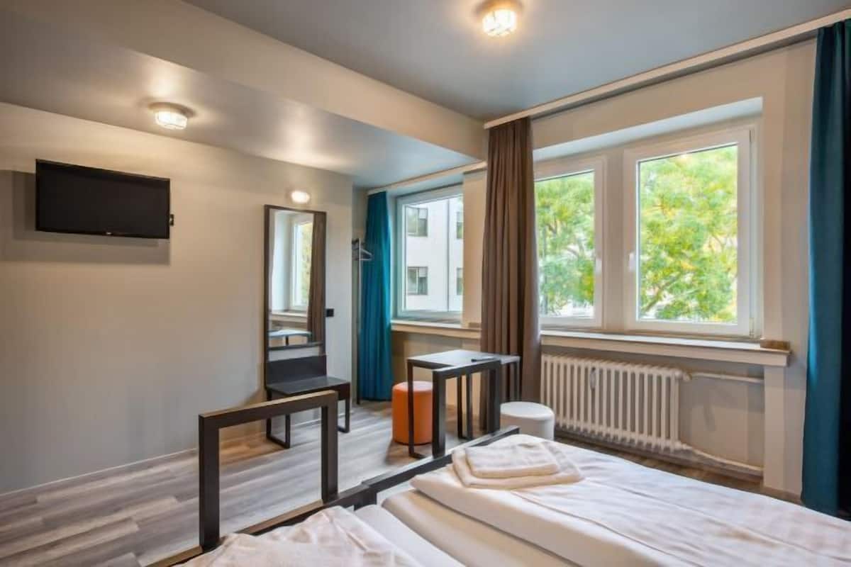 Desk, blackout drapes, iron/ironing board, free WiFi