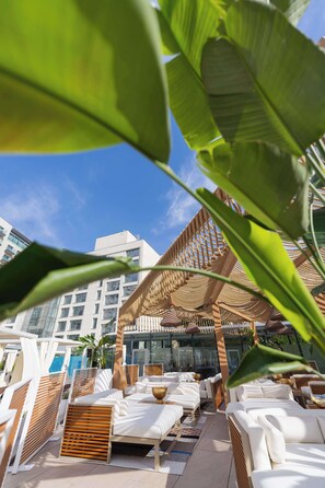 Indoor pool, seasonal outdoor pool, pool umbrellas, pool loungers