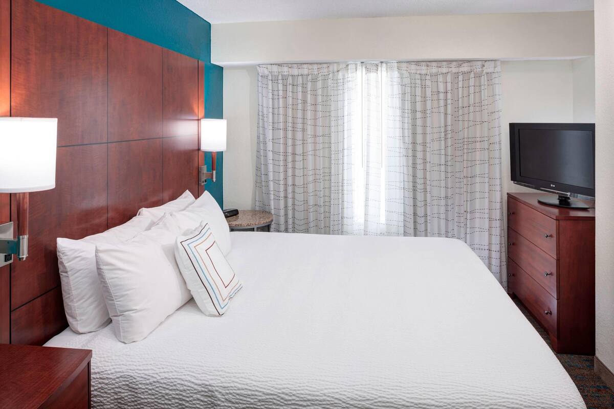 premium bedding, desk, laptop workspace, iron/ironing board