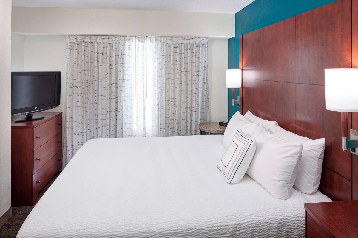 premium bedding, desk, laptop workspace, iron/ironing board