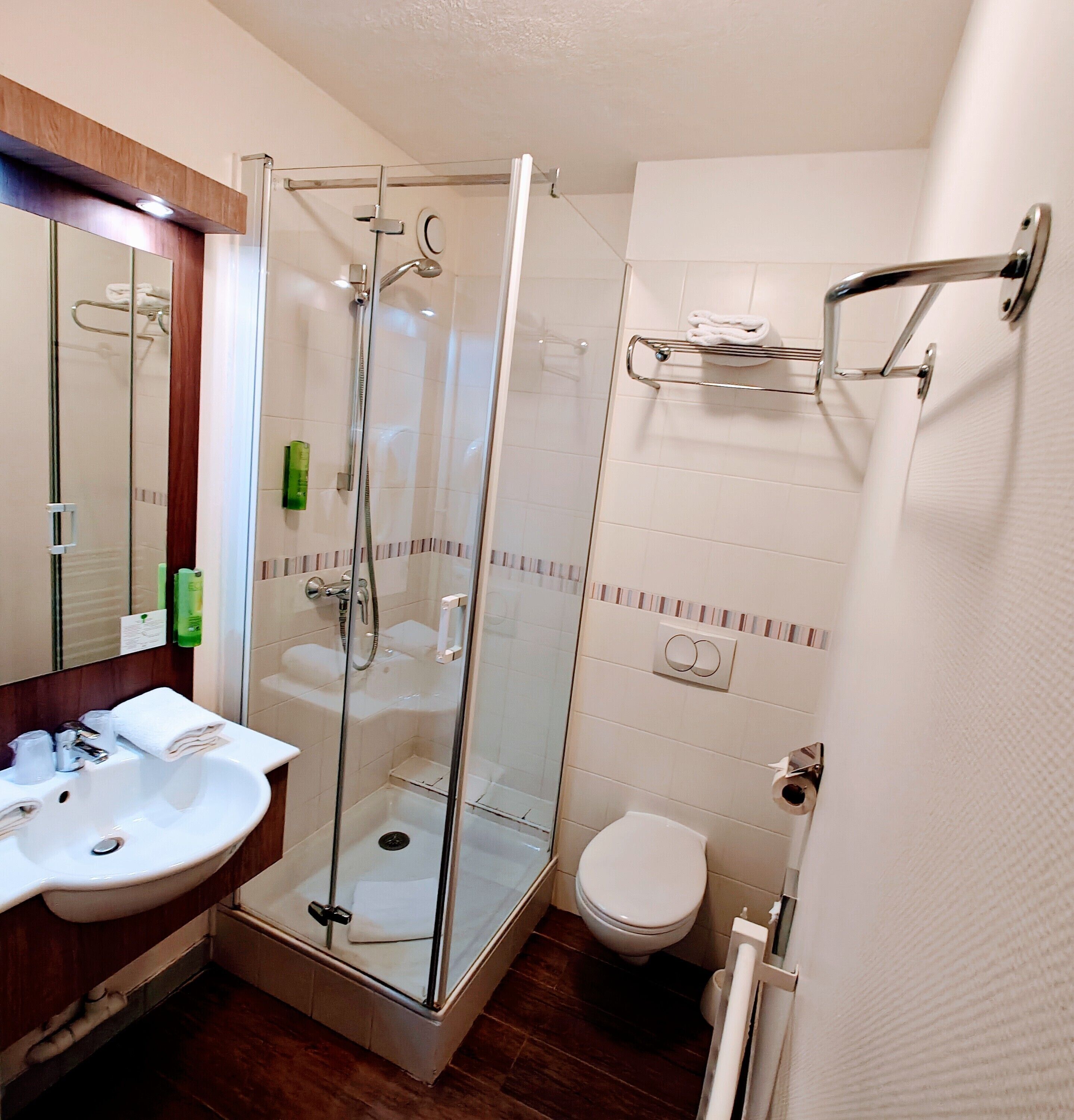 shower, rainfall showerhead, hair dryer, towels