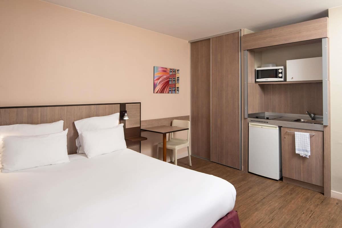 Premium bedding, desk, soundproofing, iron/ironing board