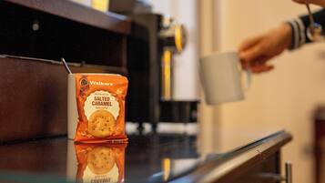 A bag of Walkers salted caramel biscuits on a table.