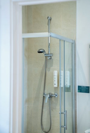 Apartment, 2 Bedrooms | Bathroom | Shower, eco-friendly toiletries, hair dryer, towels