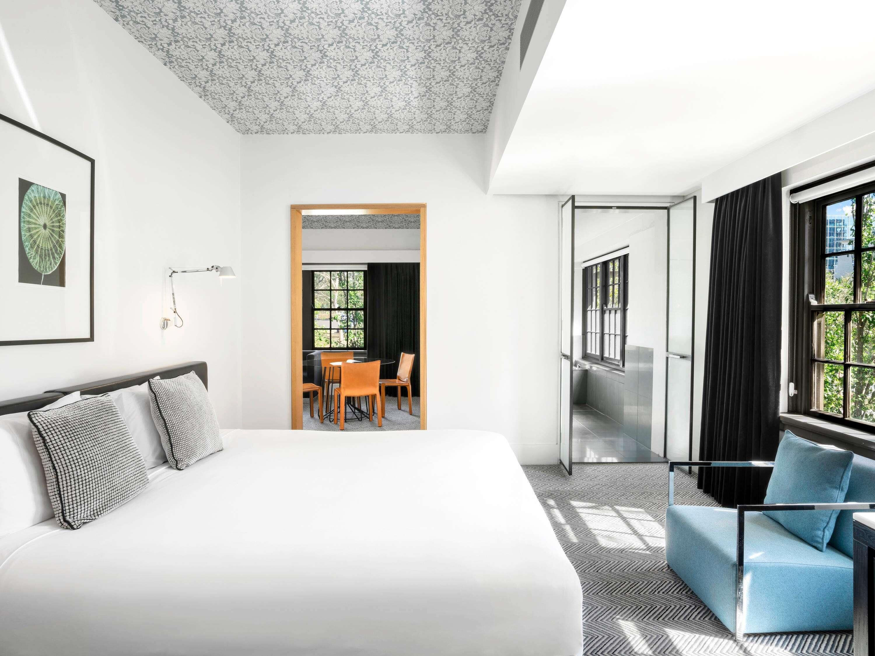 Deluxe Suite, 1 King Bed | Pillowtop beds, minibar, in-room safe, desk