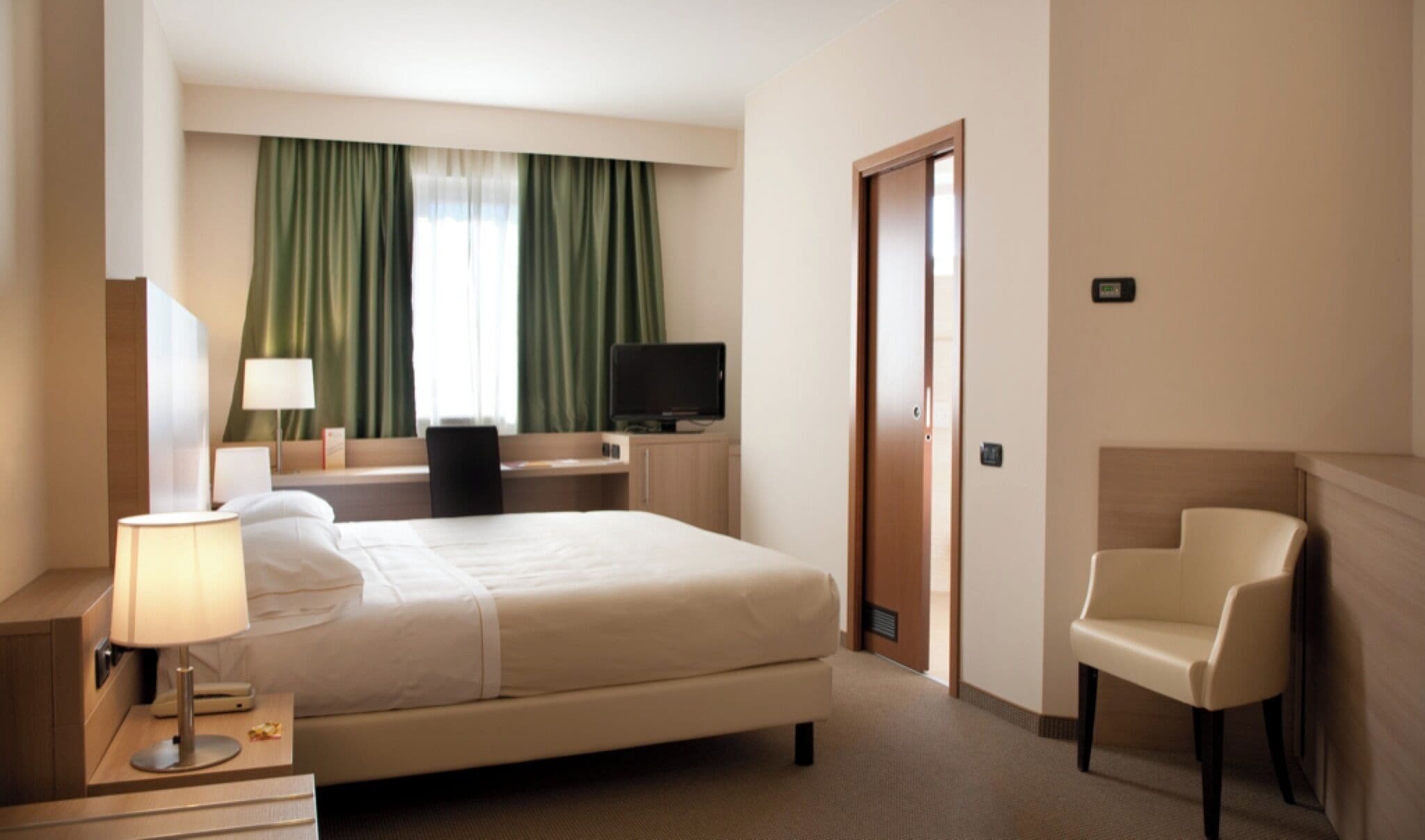 premium bedding, down duvets, minibar, in-room safe