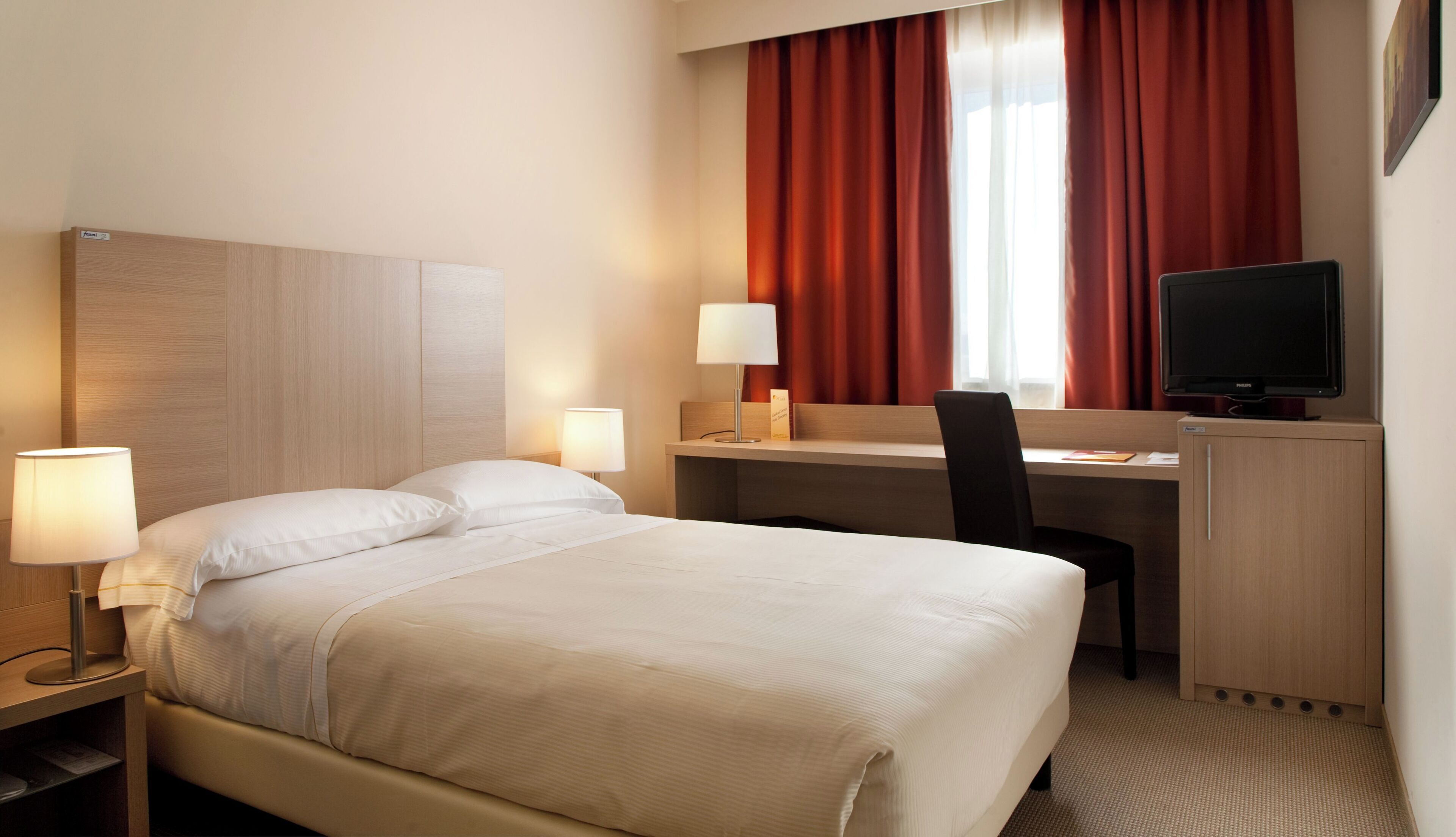 premium bedding, down duvets, minibar, in-room safe