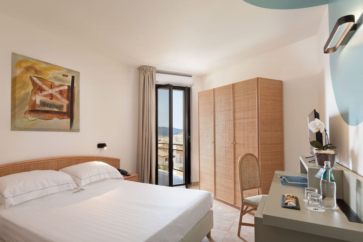 Standard Double or Twin Room, Balcony, Sea View | 1 bedroom, minibar, in-room safe, desk