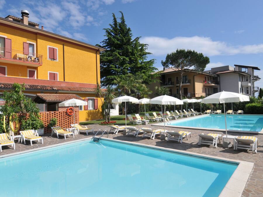 2 outdoor pools, pool umbrellas, pool loungers