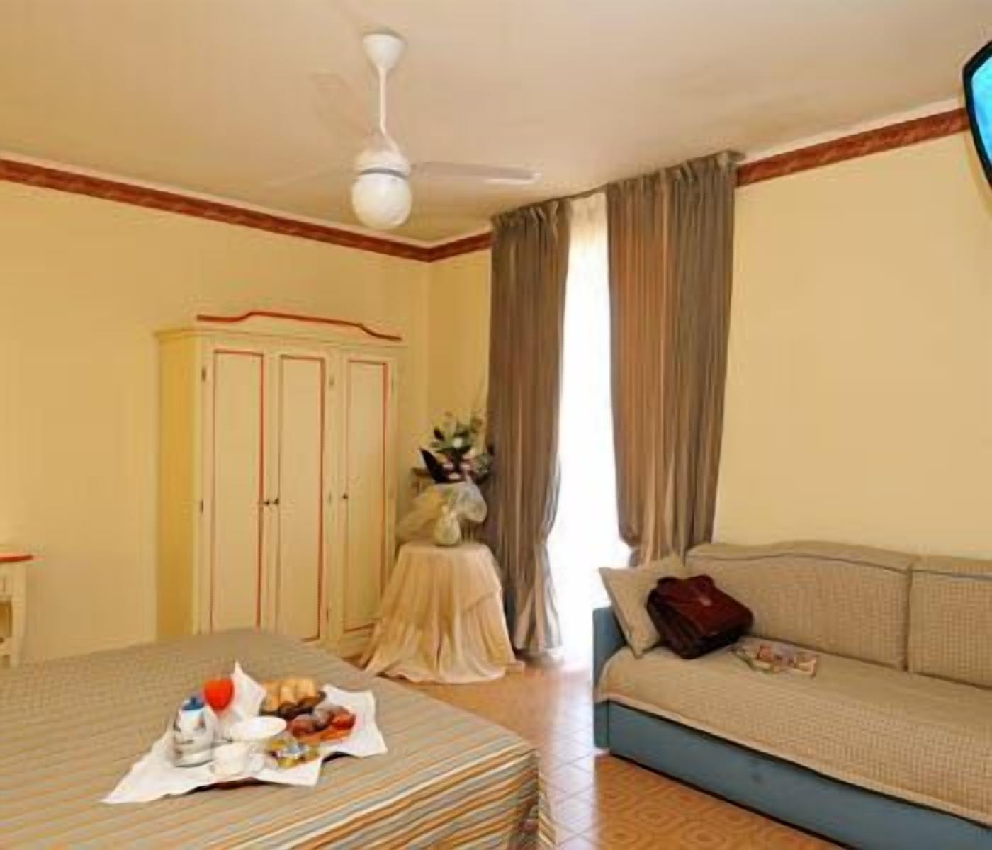 superior double room | living area | plasma tv