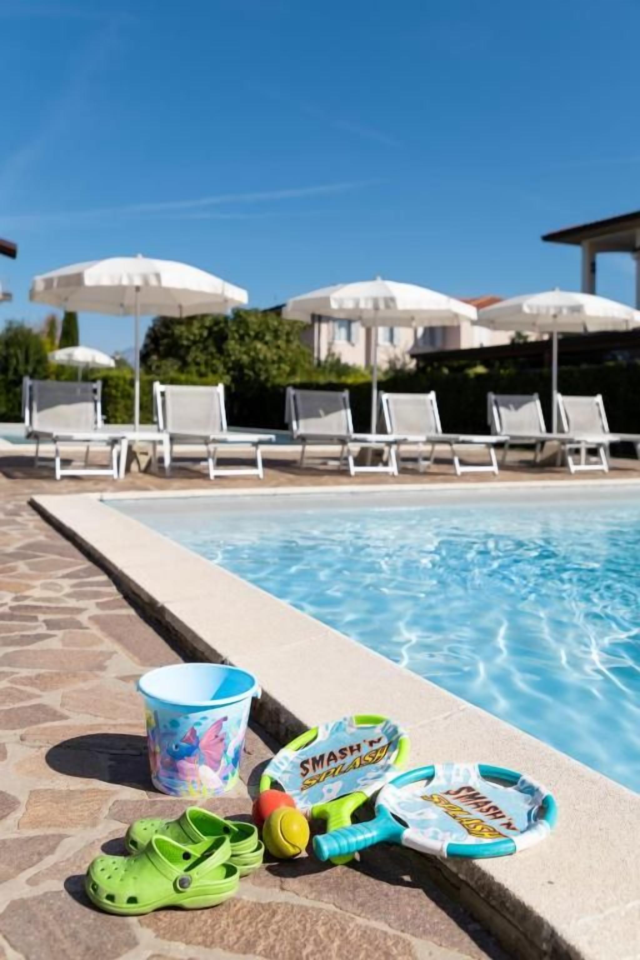 2 outdoor pools, pool umbrellas, sun loungers