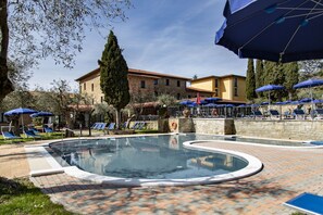 Outdoor pool, pool umbrellas, pool loungers