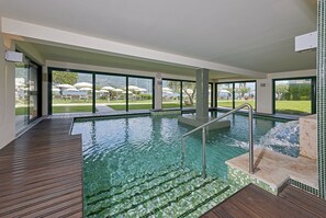 Indoor pool, 2 outdoor pools, pool umbrellas, sun loungers