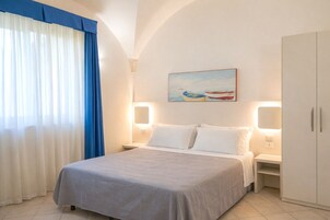 Economy Room, 1 Bedroom | In-room safe, bed sheets, wheelchair access