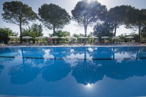 Outdoor pool, pool umbrellas, sun loungers
