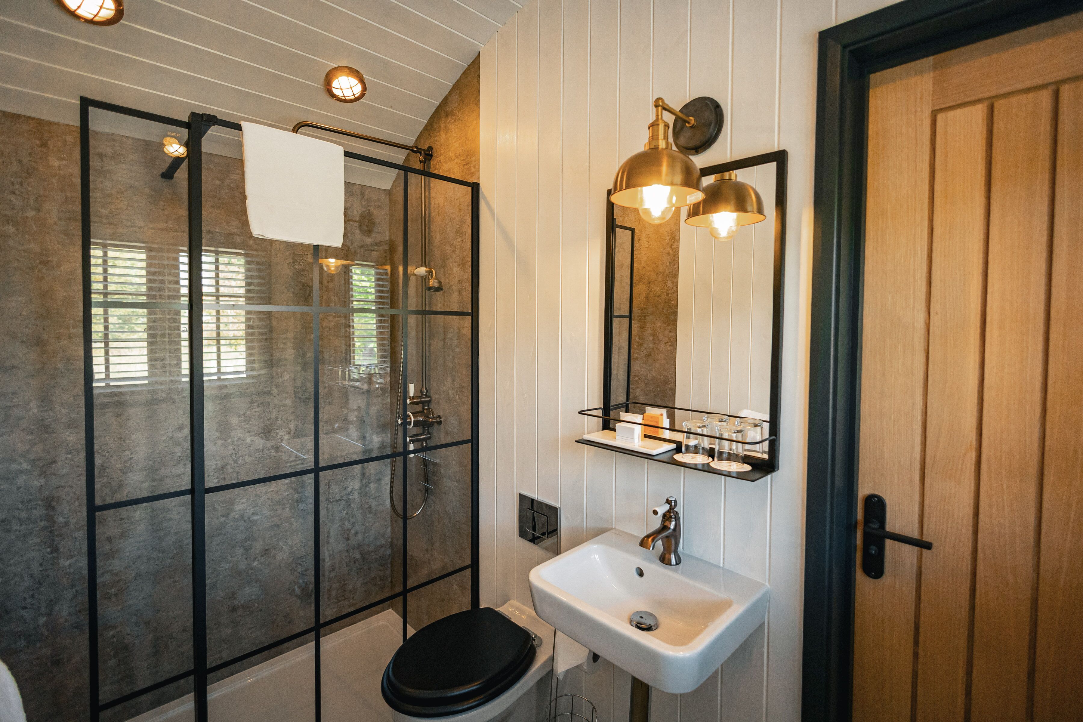 lake hut | bathroom | designer toiletries, hair dryer, towels, soap
