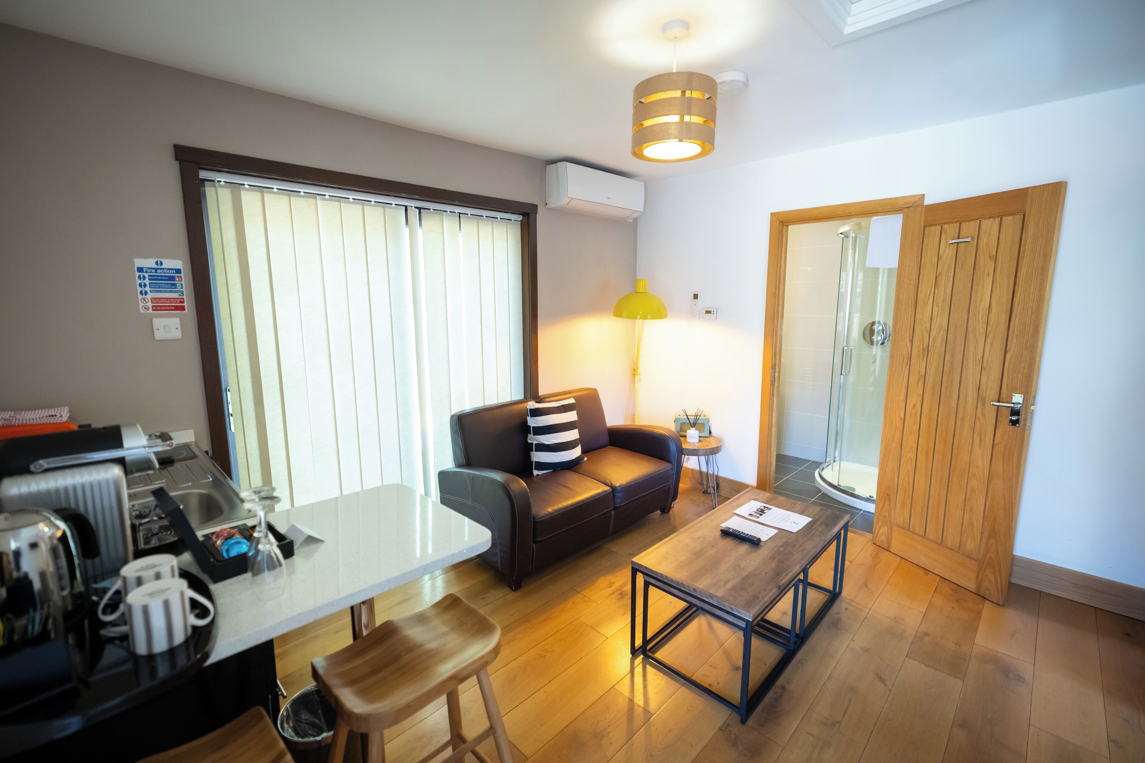 Riverside Lodge with Hot Tub | Premium bedding, in-room safe, individually decorated