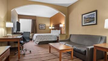 Suíte, 1 cama King, para não fumantes, geladeira e micro-ondas | Escrivaninha, cortinas blackout, ferros/tábuas de passar roupa