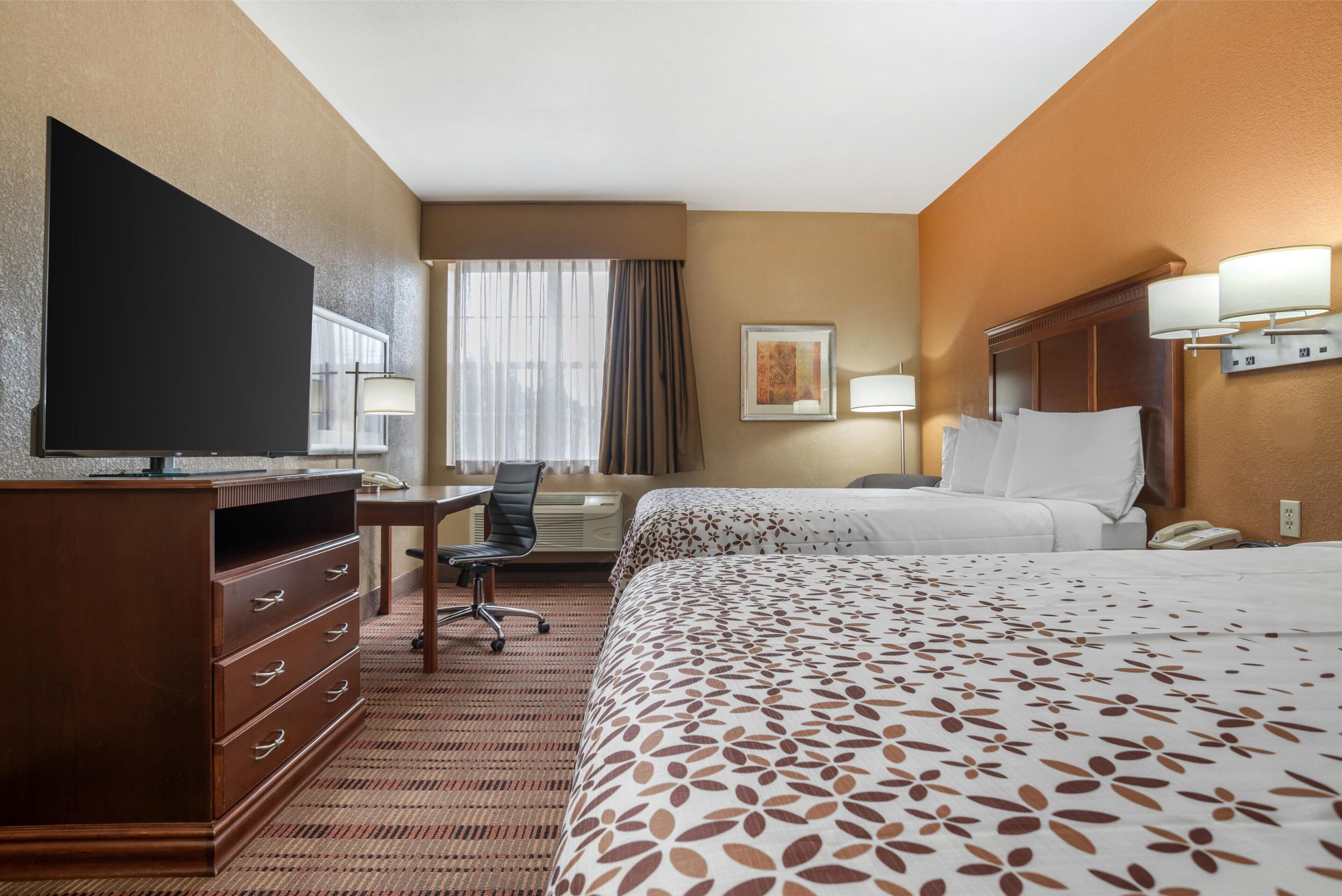 standard room, 2 queen beds, non smoking, refrigerator & microwave | 1 bedroom, desk, blackout curtains, iron/ironing board