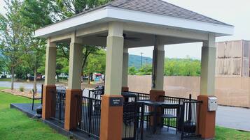 A gazebo-style outdoor seating area with a sign reading "Gazebo Grill".