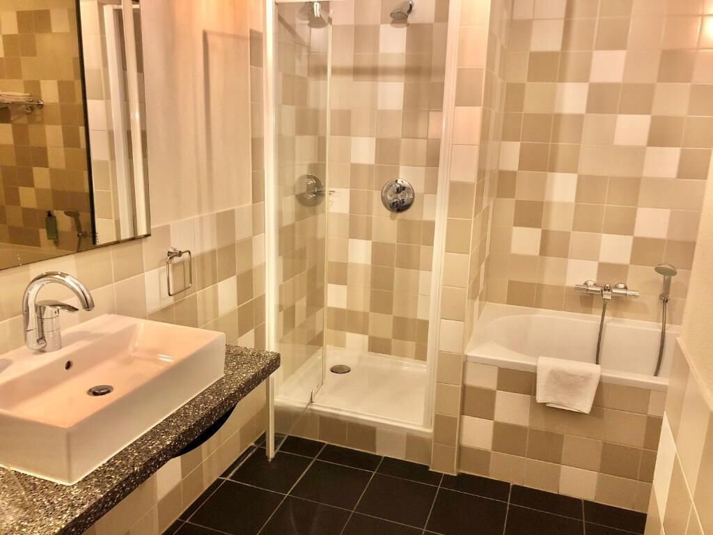 separate bathtub and shower, free toiletries, hair dryer, towels