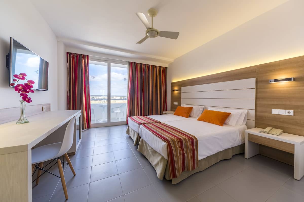 Desk, blackout curtains, free WiFi, bed sheets