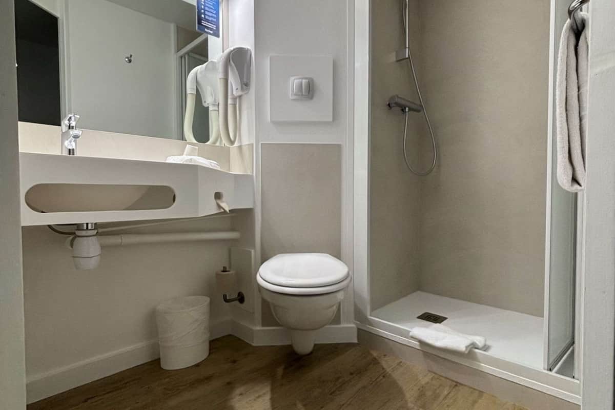 shower, eco-friendly toiletries, hair dryer, towels