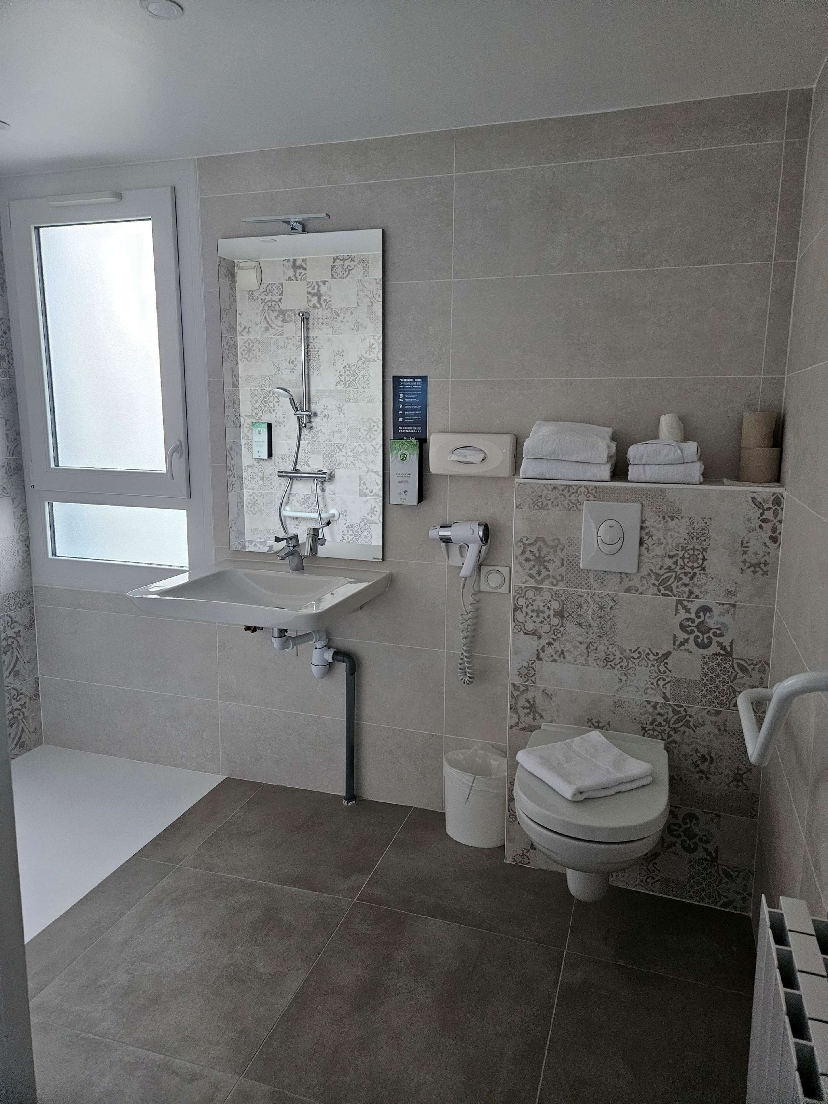 shower, eco-friendly toiletries, hair dryer, towels