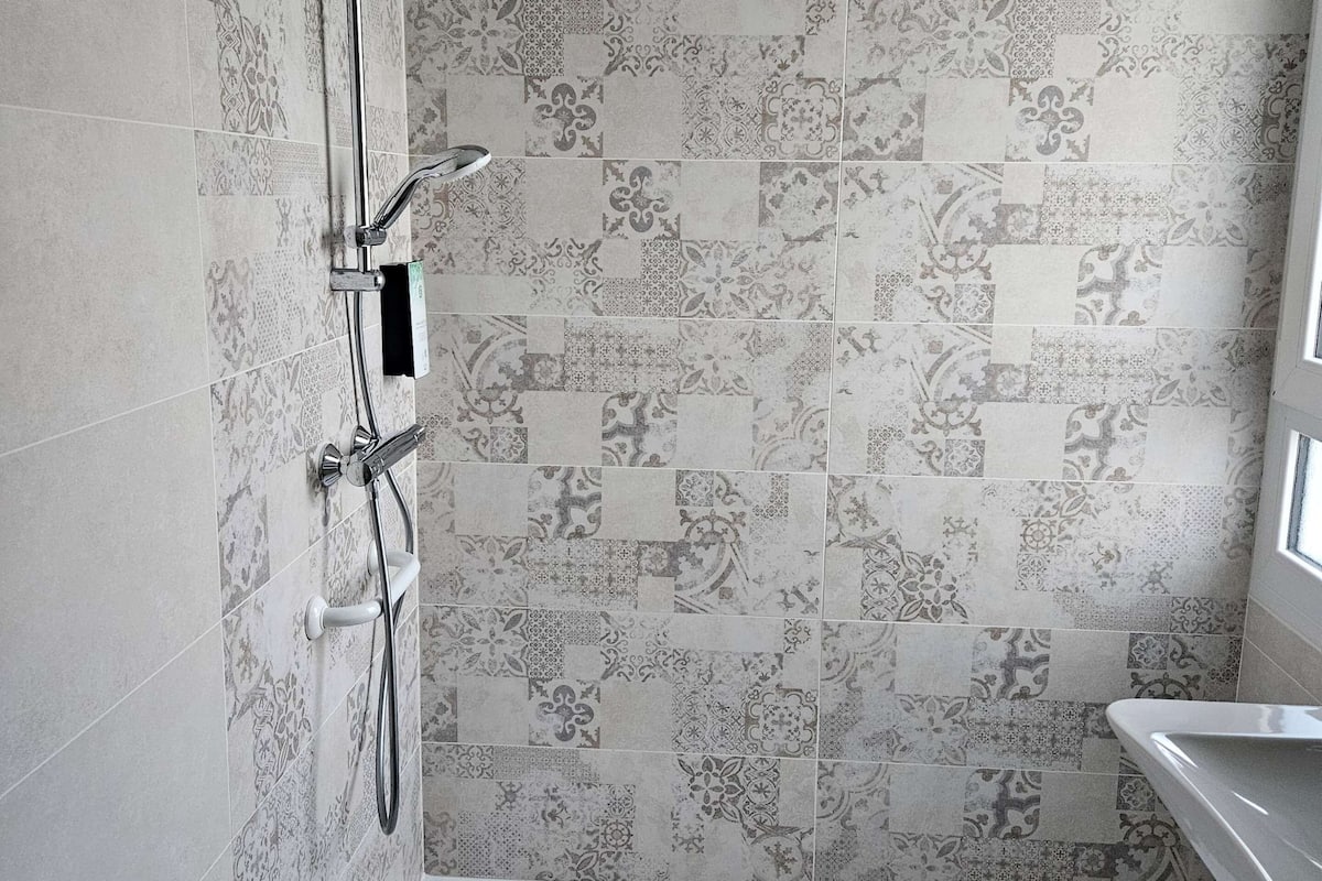 shower, eco-friendly toiletries, hair dryer, towels