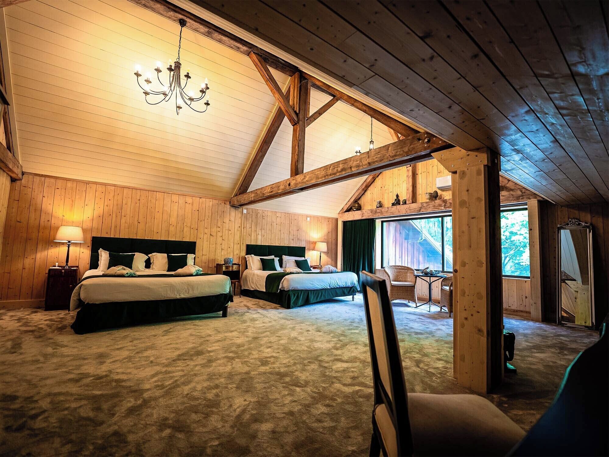 family suite, 2 bedrooms, garden view | in-room safe, individually decorated, soundproofing, iron/ironing board