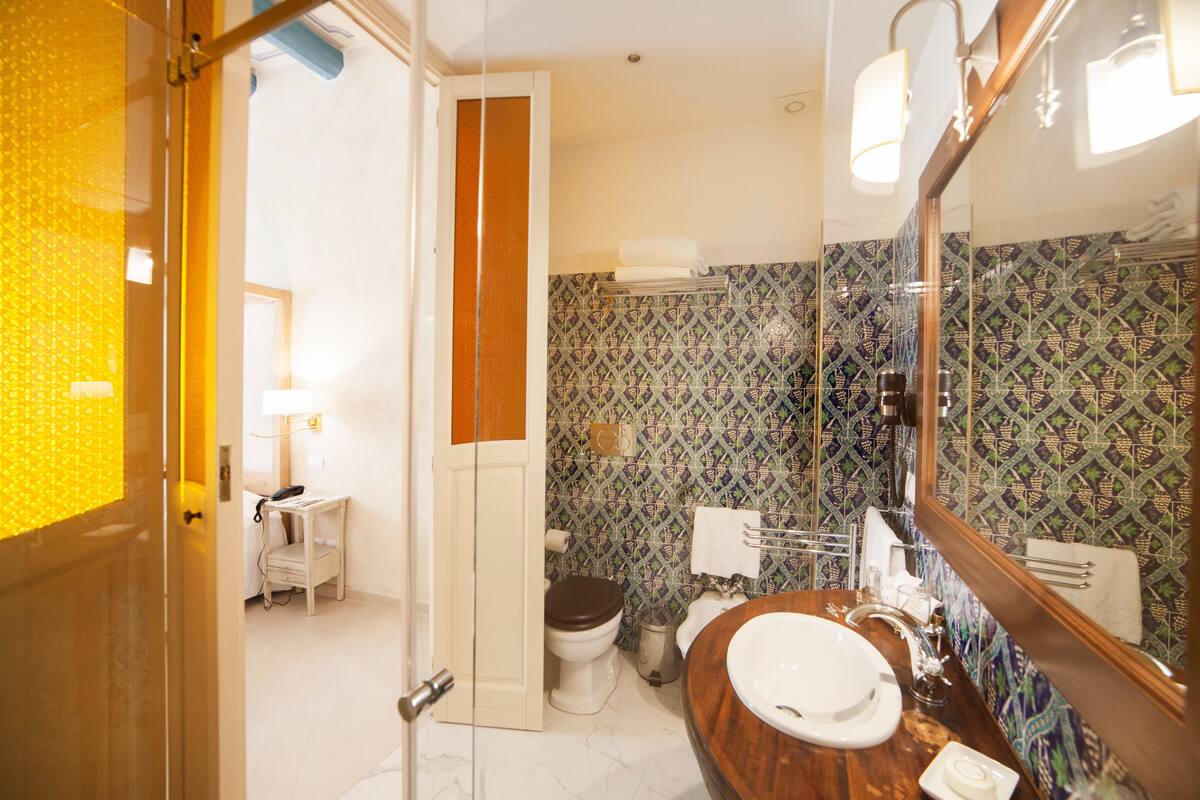 family room connected rooms(classic room and superior room)  | bathroom | rainfall showerhead, free toiletries, hair dryer, towels