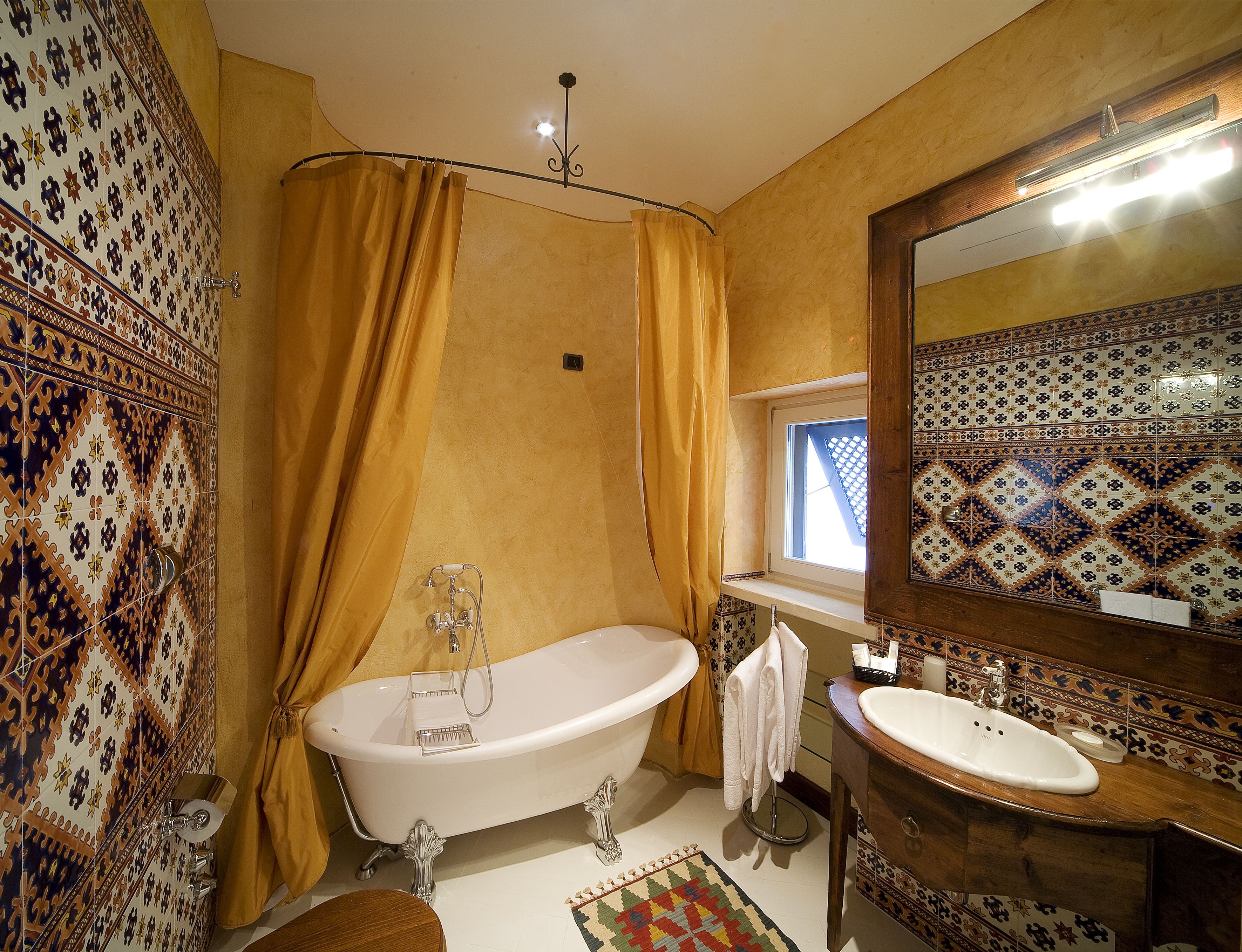 deluxe room (spa) | bathroom | rainfall showerhead, free toiletries, hair dryer, towels