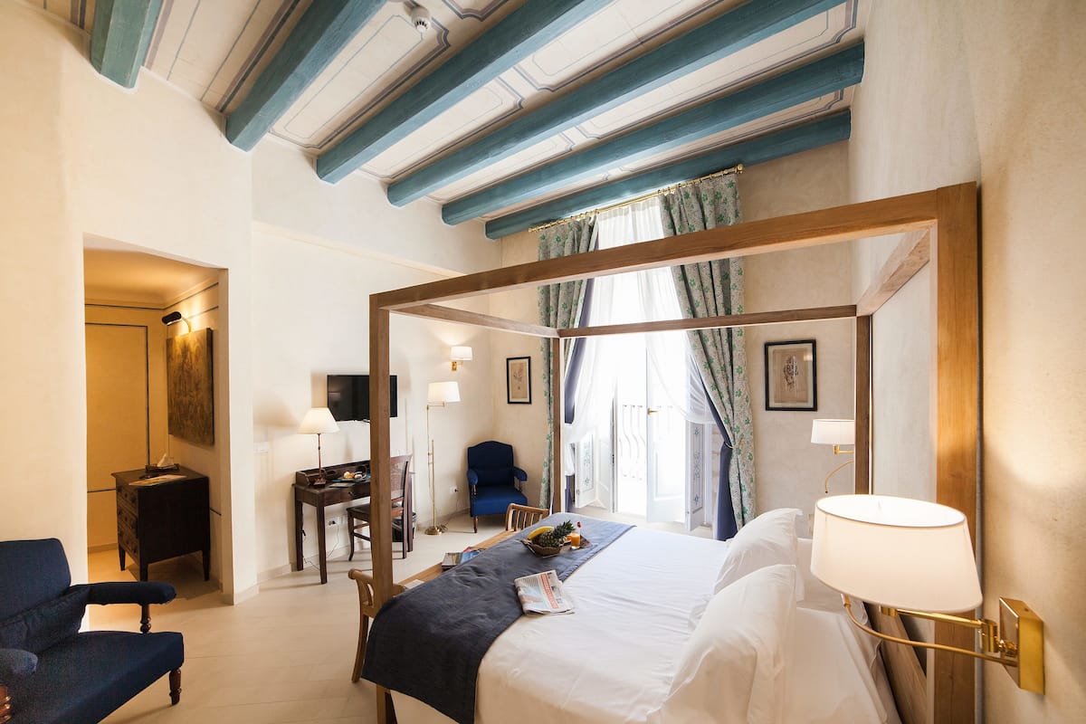 large family room connected rooms (junior suite and classic room)  | free minibar, in-room safe, individually decorated, desk