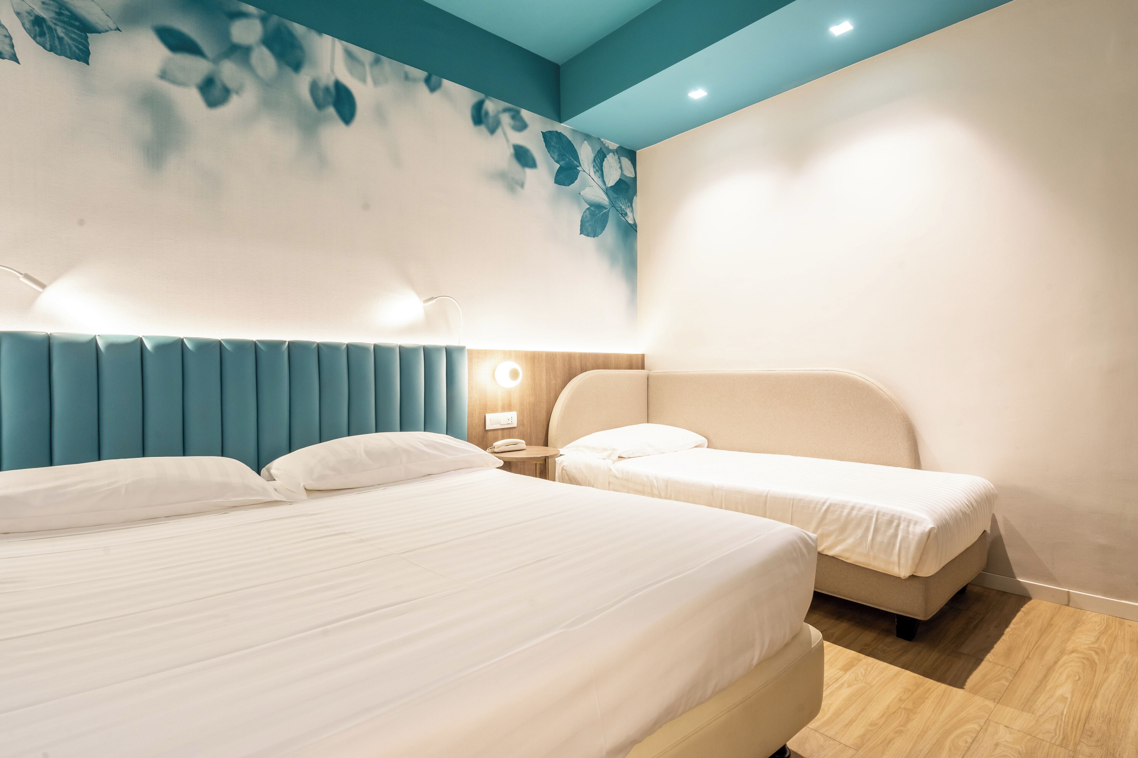 deluxe triple room | 1 bedroom, down duvets, minibar, in-room safe