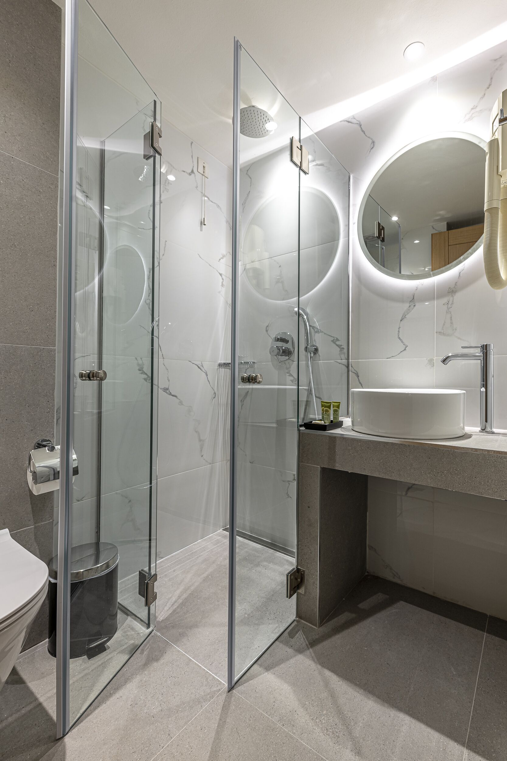 shower, eco-friendly toiletries, hair dryer, towels