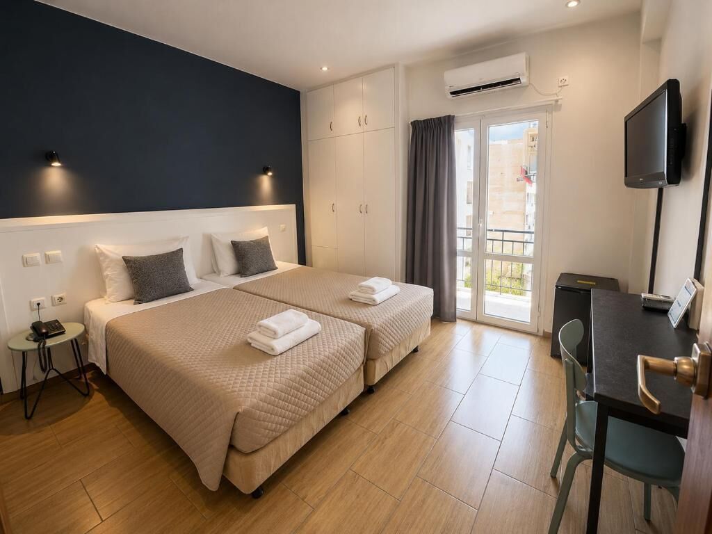 Twin Room | Desk, blackout drapes, soundproofing, iron/ironing board