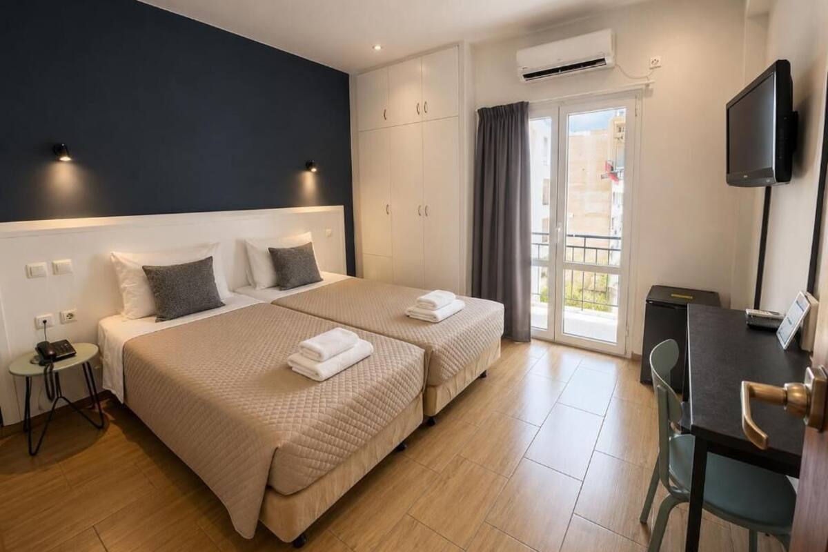 Twin Room | Desk, blackout drapes, soundproofing, iron/ironing board (on request)
