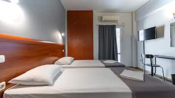 Triple Room | Desk, blackout drapes, soundproofing, iron/ironing board