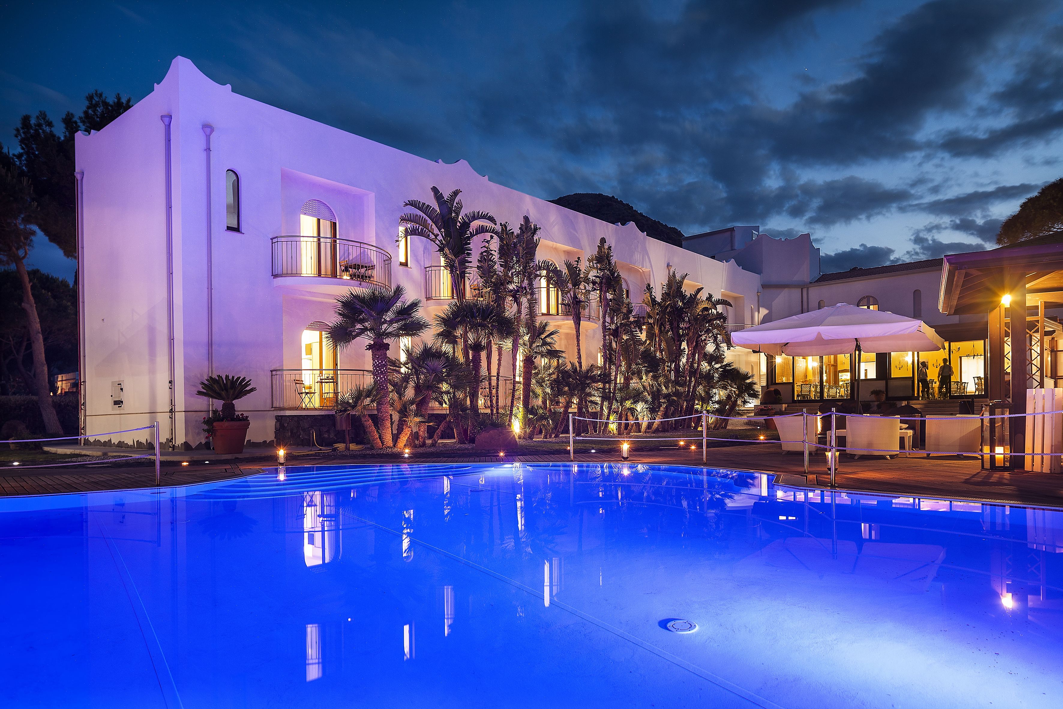 seasonal outdoor pool, pool umbrellas, pool loungers