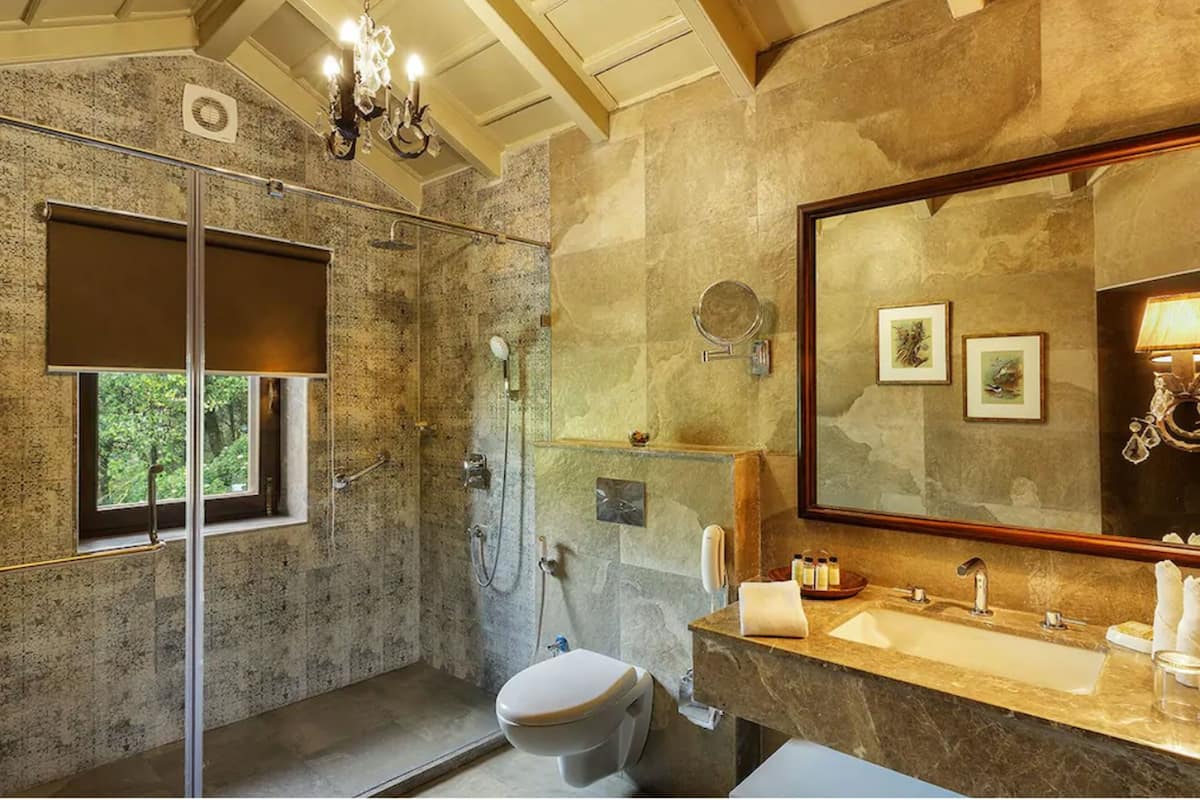 naini royal rooms | bathroom | free toiletries, slippers, towels