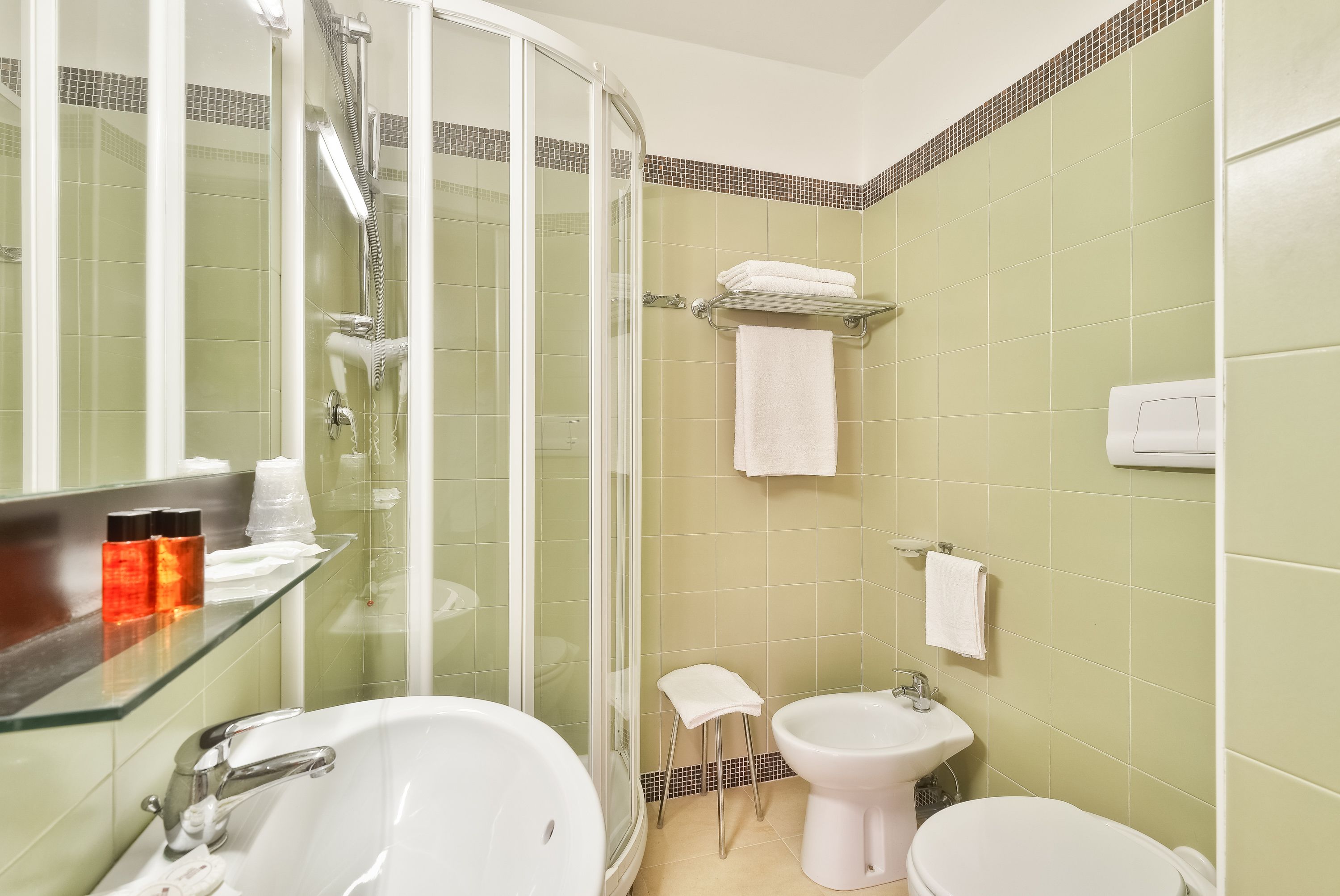 free toiletries, hair dryer, bidet, towels