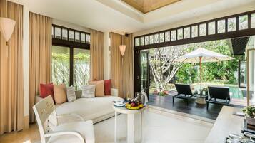 Presidential Suite, 2 Bedrooms | Living area | 40-inch Smart TV with cable channels