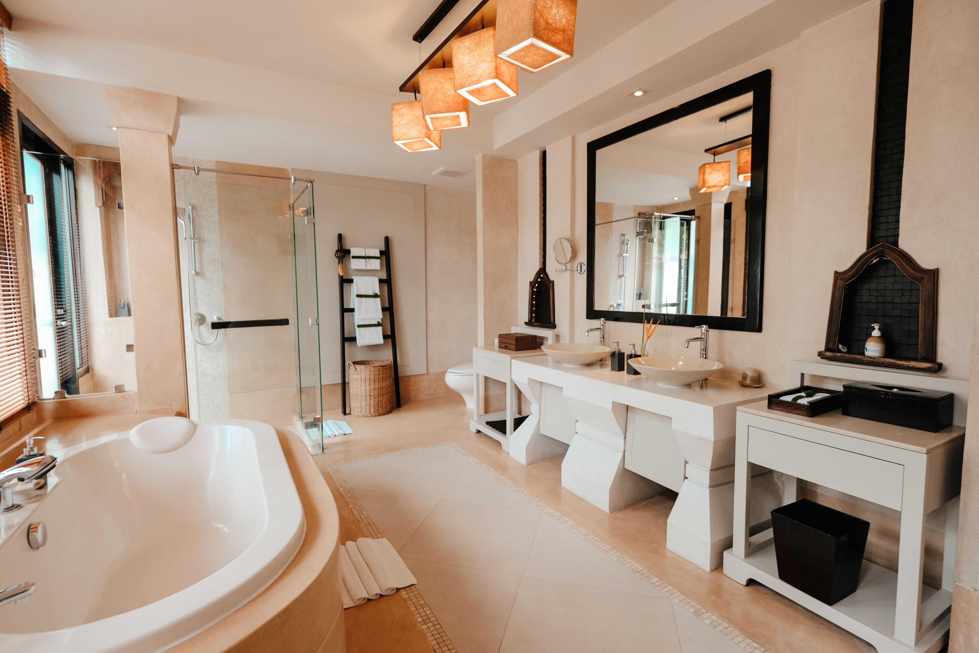 family pool villa suite | bathroom | hair dryer, bathrobes, slippers, towels