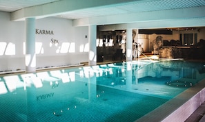Indoor pool, open 7:00 AM to 10:00 PM, pool umbrellas, pool loungers