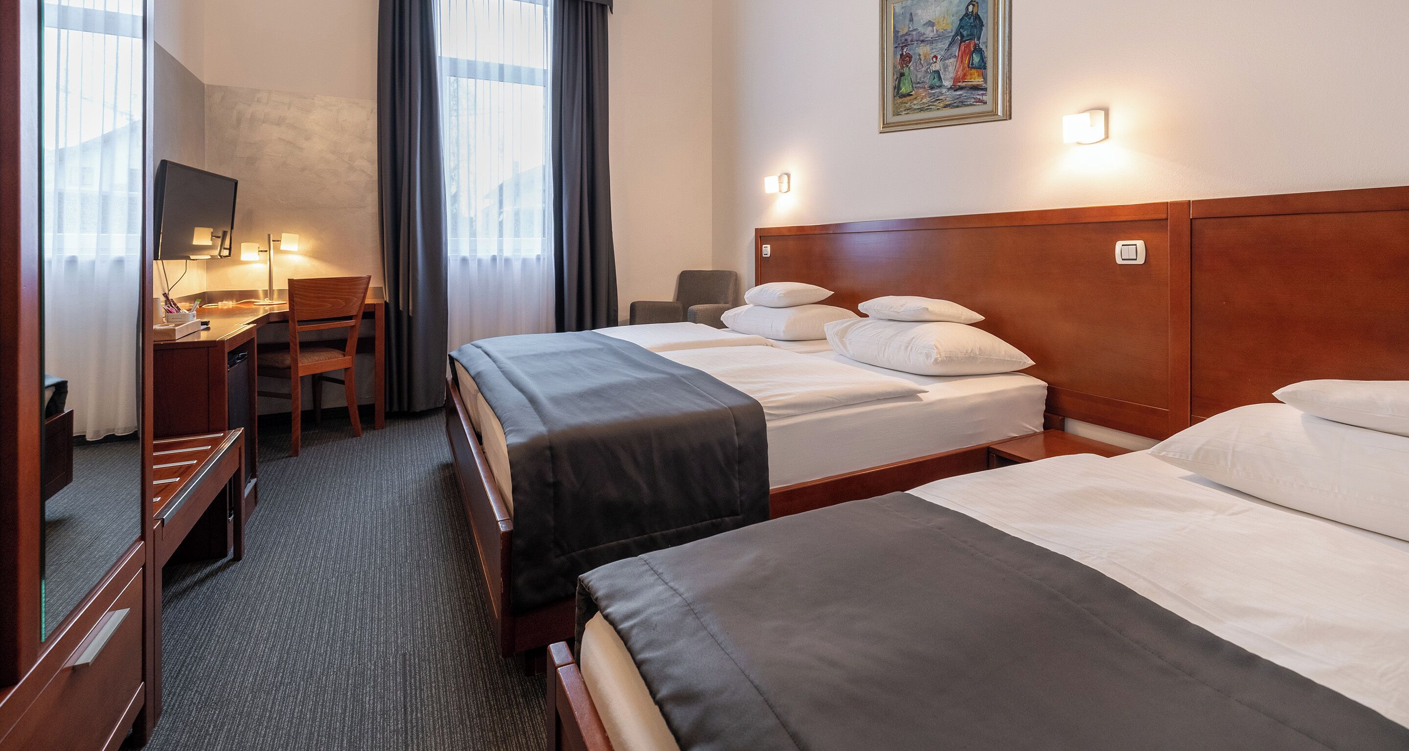 Premium bedding, down comforters, pillowtop beds, minibar