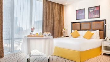 Executive Suite King Room | Literie de qualité supérieure, minibar, coffres-forts dans les chambres