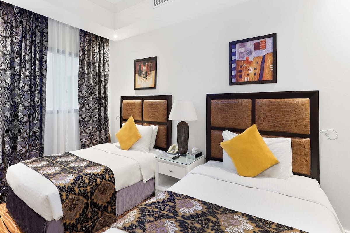 Executive Suite Twin Room | Premium bedding, minibar, in-room safe, individually furnished