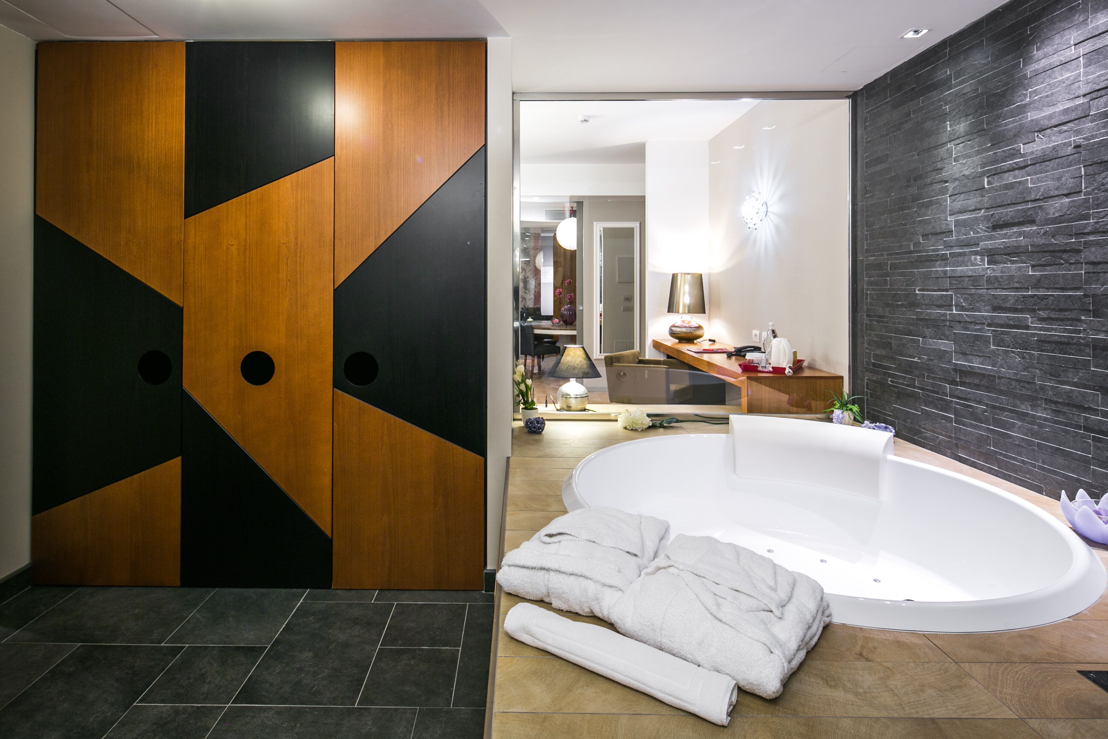 suite magnolia | bathroom | hair dryer, bidet, towels, soap