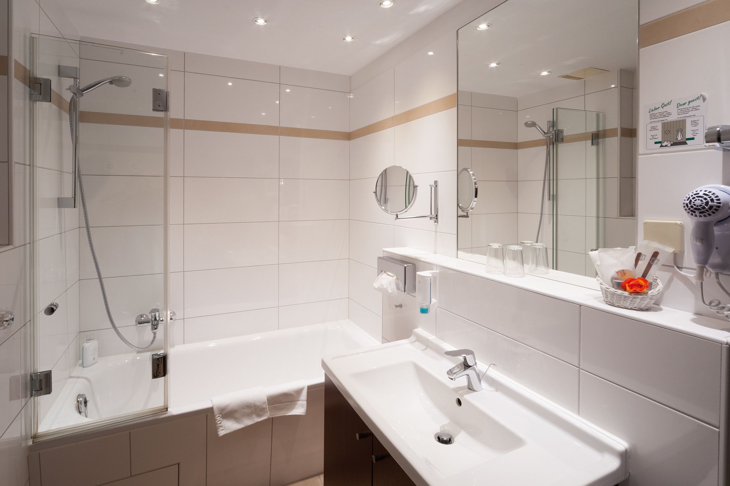 free toiletries, hair dryer, slippers, towels